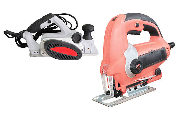 istock electric plane and fret-saw 536078915