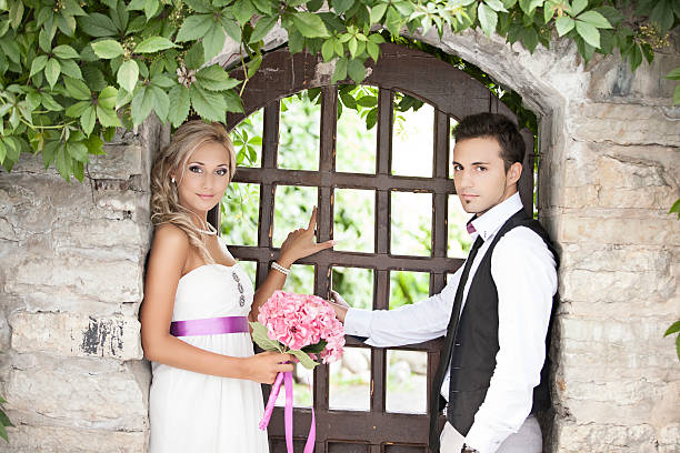 istock wedding, happy young man and woman celebrating 536078921