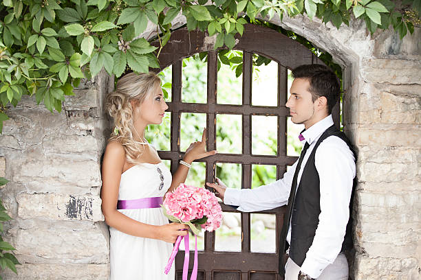 istock wedding, happy young man and woman celebrating 536078923