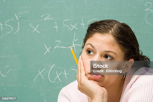 Portrait Of A Female Student Stock Photo - Download Image Now - Mathematical Symbol, Mathematics, Student