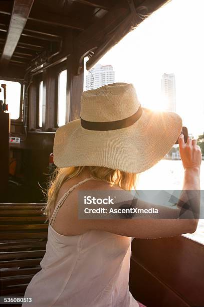 Woman Takes Pic With Smart Phone On River Boat Stock Photo - Download Image Now - 2015, Adult, Bangkok