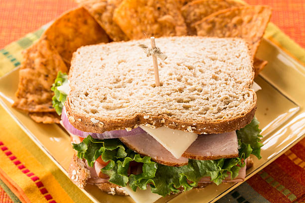 istock Turkey and Ham Healthy Lunch Sandwich on Wheat Bread 536081505