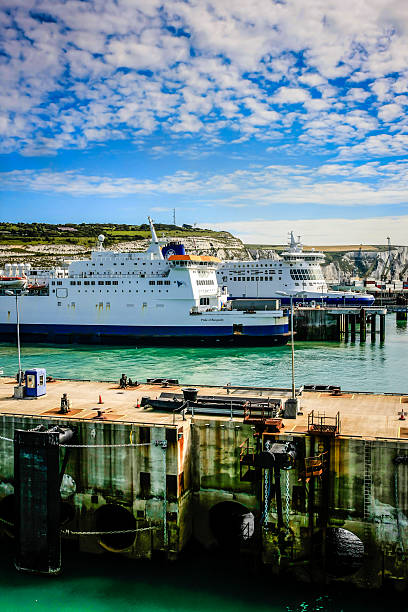 The port of Dover and moored Cross-Channel Ferry boats . Dover, Kent, England - June 26, 2012: Cross-channel ferries in Dover port England awaiting their departure to Calais France ferry dover england calais france uk stock pictures, royalty-free photos & images