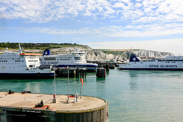 The port of Dover and moored Cross-Channel Ferry boats Dover, Kent, England - June 26, 2012: Cross-channel ferries in Dover port England awaiting their departure to Calais France ferry dover england calais france uk stock pictures, royalty-free photos & images