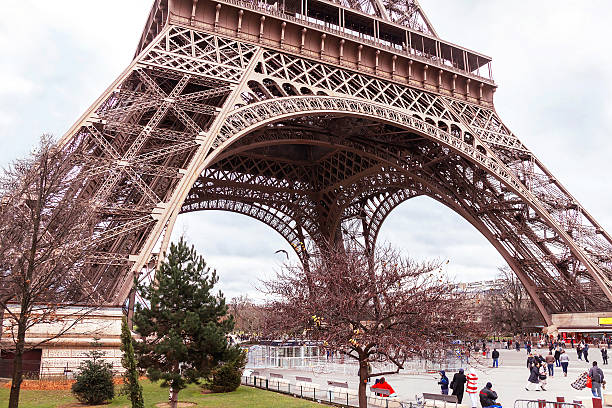Eiffel Tower from low angle at sunrise – Paris, France