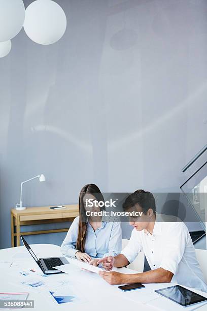 Working Together Stock Photo - Download Image Now - 2015, A Helping Hand, Administrator
