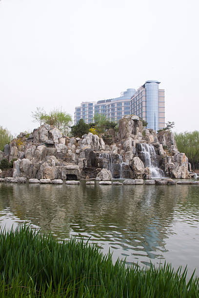 istock High rise buildings and park landscape 536088795