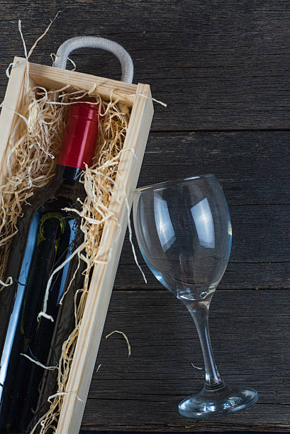 istock Vintage wooden wine case with bottle 536089321