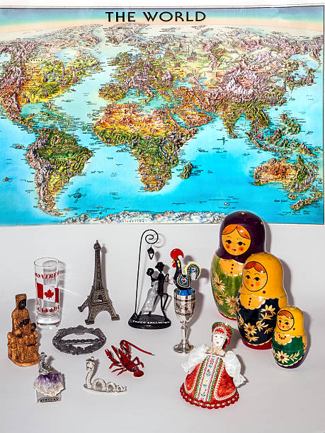 istock Souvenirs from different countries on world map background. 536090383
