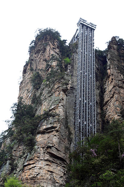 Bailong Elevator in Zhangjiajie scenic area, Hunan, China Zhangjiajie City, April 13: Bailong Elevator building landscape on April 13, 2012, Zhangjiajie City, Hunan, China hunan province photos stock pictures, royalty-free photos & images