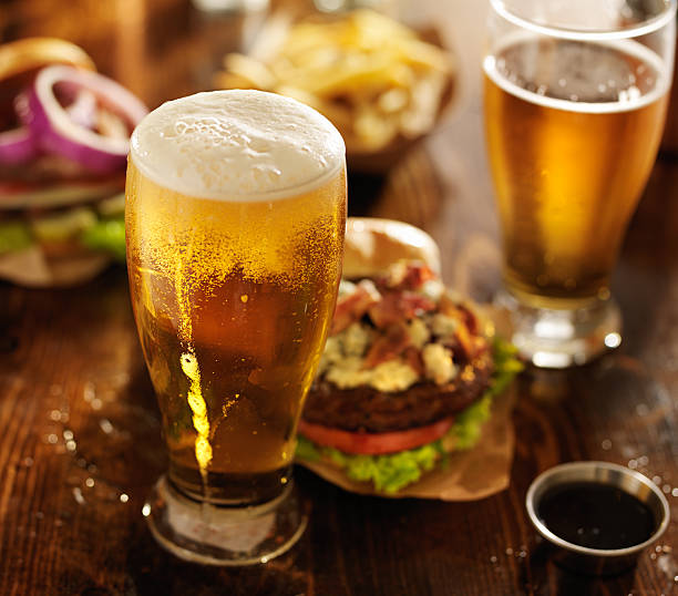 pub food - beer and burgers stock photo