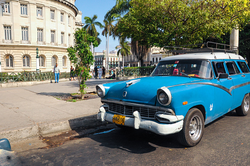 Havana, Cuba - January 20, 2013: Old classic American car drive on street of Havana,CUBA. Old American cars are iconic sight of Cuba street.