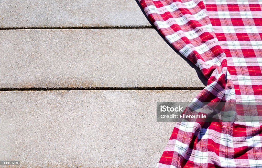Picnic tablecloth on the table Picnic tablecloth textile on the table background Picnic Table Stock Photo
