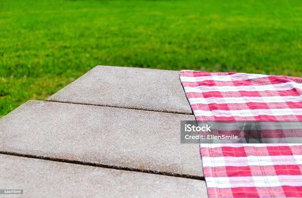 Picnic tablecloth on the table Picnic tablecloth textile on the table background Picnic Table Stock Photo