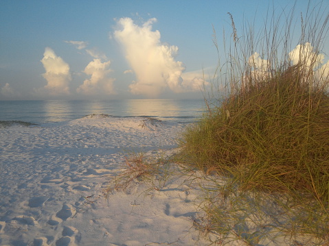 sunrise walk on white sand beach with in siesta key florida