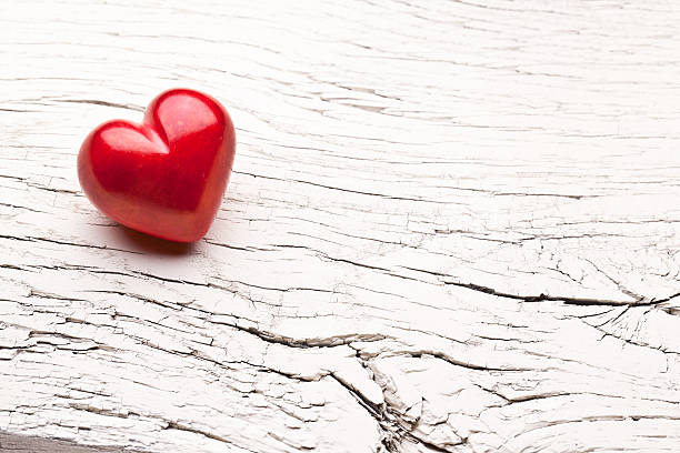 istock Red heart on a wooden table. 536135025