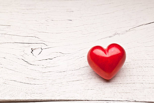 istock Red heart on a wooden table. 536135029