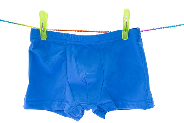 istock Children's blue swimming shorts isolated on white background. 536136407