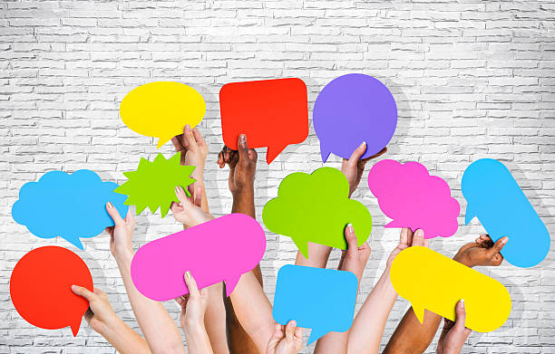 istock Group of Human Arms Raised wiht Speech Bubble 536136793