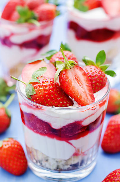 istock layered dessert with strawberries, biscuit cake and cream cheese 536137493