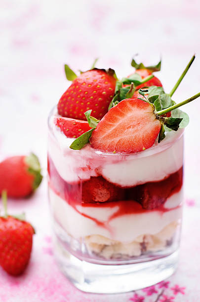 istock layered dessert with strawberries, biscuit cake and cream cheese 536137499