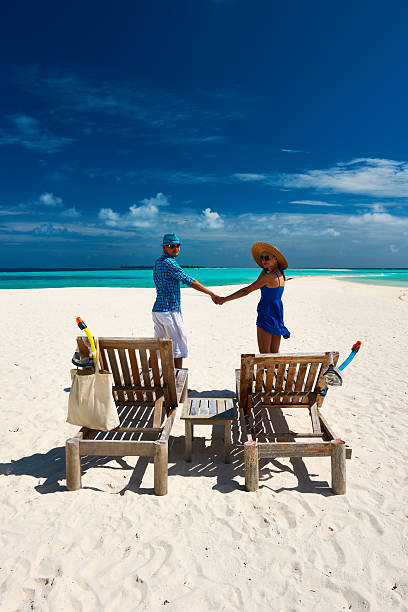 istock Couple in blue on a beach at Maldives 536171145