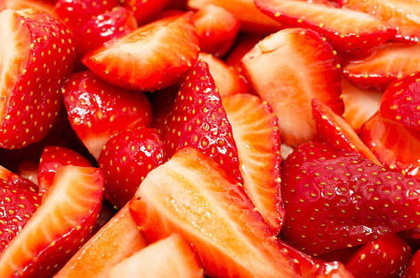 istock Background texture of sliced strawberries marinated in sugar 536171567