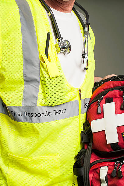 istock Medical First Responder with First Aid Back Pack, Stethoscope, Vest. 536171743