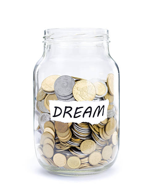 Jar with coins on Dream Jar with coins on Dream, money isolated on white. australian 5 cents stock pictures, royalty-free photos & images