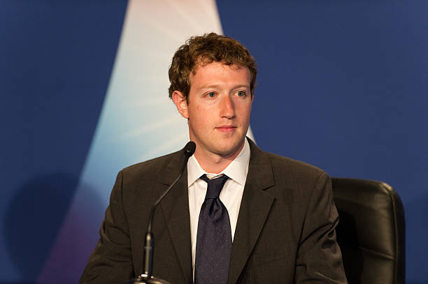 Mark Zuckerberg at G8 in Deauville, France Deauville, France - MAY 26, 2011 : Facebook CEO Mark Zuckerberg participates to a conference about web technologies during the french G8 in the north of France with the Google CEO Eric Schmidt, Hiroshi Mikitani, founder of Rakuten, the Businessman in advertising Maurice Levy and the Orange CEO Eric Richard. hypertext transfer protocol photos stock pictures, royalty-free photos & images