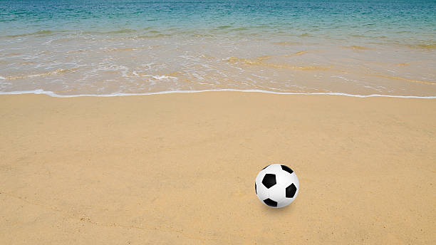 istock Football game on beach 536189693