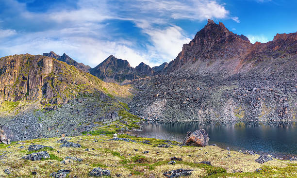 istock Deepest lake under the mountain peak. Eastern Siberia 536192169