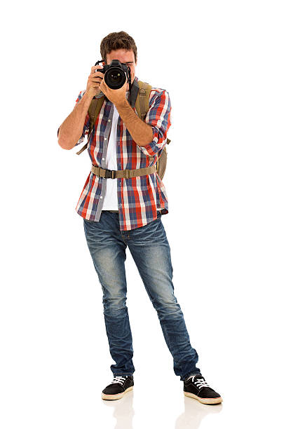istock young male tourist taking photos 536192675