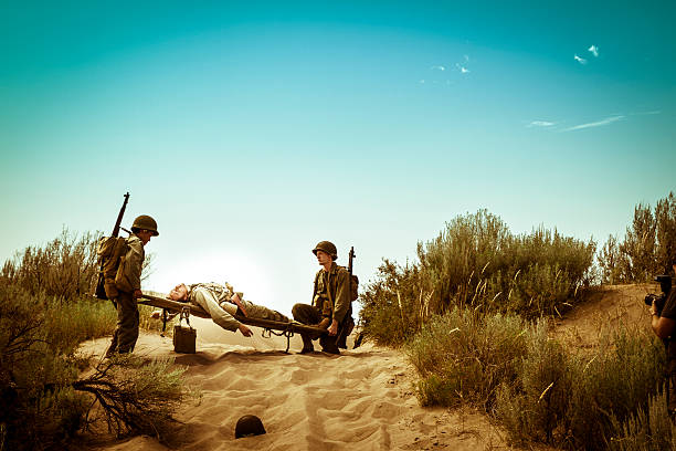 istock WWII Medics With Stretcher Rush To Save A Fallen Soldier 536193057