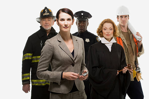 Firefighter police officer judge construction worker and businesswoman Firefighter police officer judge construction worker and businesswoman police and firemen stock pictures, royalty-free photos & images