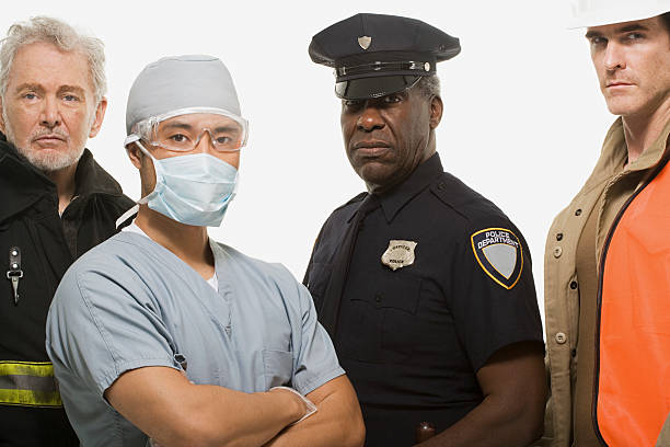 Firefighter surgeon police officer and construction worker Firefighter surgeon police officer and construction worker emergency services occupation stock pictures, royalty-free photos & images