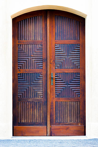 istock Beautiful old crafed wooden door, full frame vertical composition 536194427