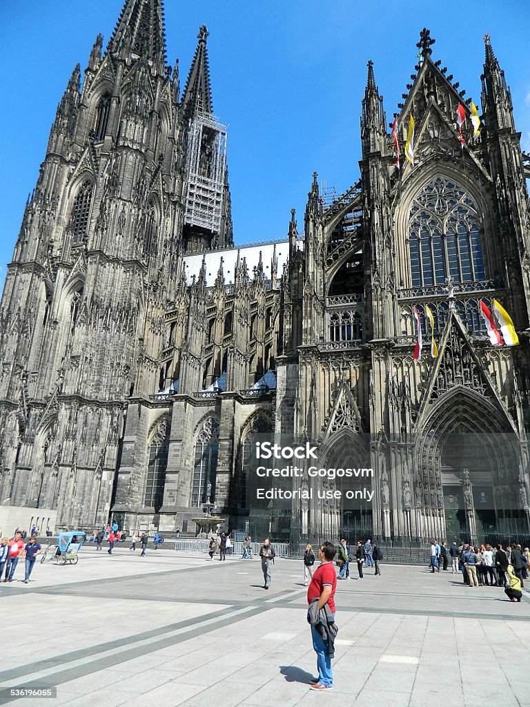 Cologne Cathedral Cologne, Germany - May 31, 2013: Panoramic view of Cologne Cathedral. People walks on street and goes somewhere in cologne, Germany. 2015 Stock Photo