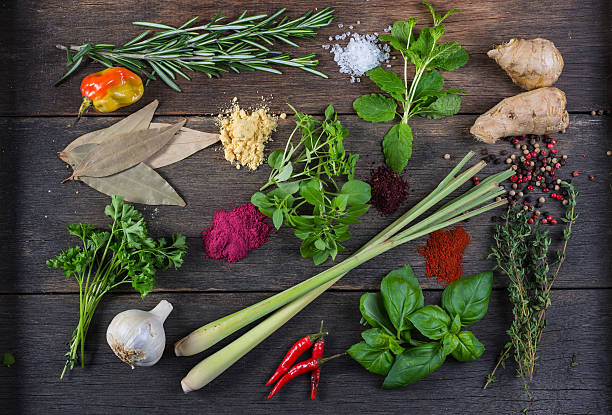 istock Herbs and spices on wooden background 536196739