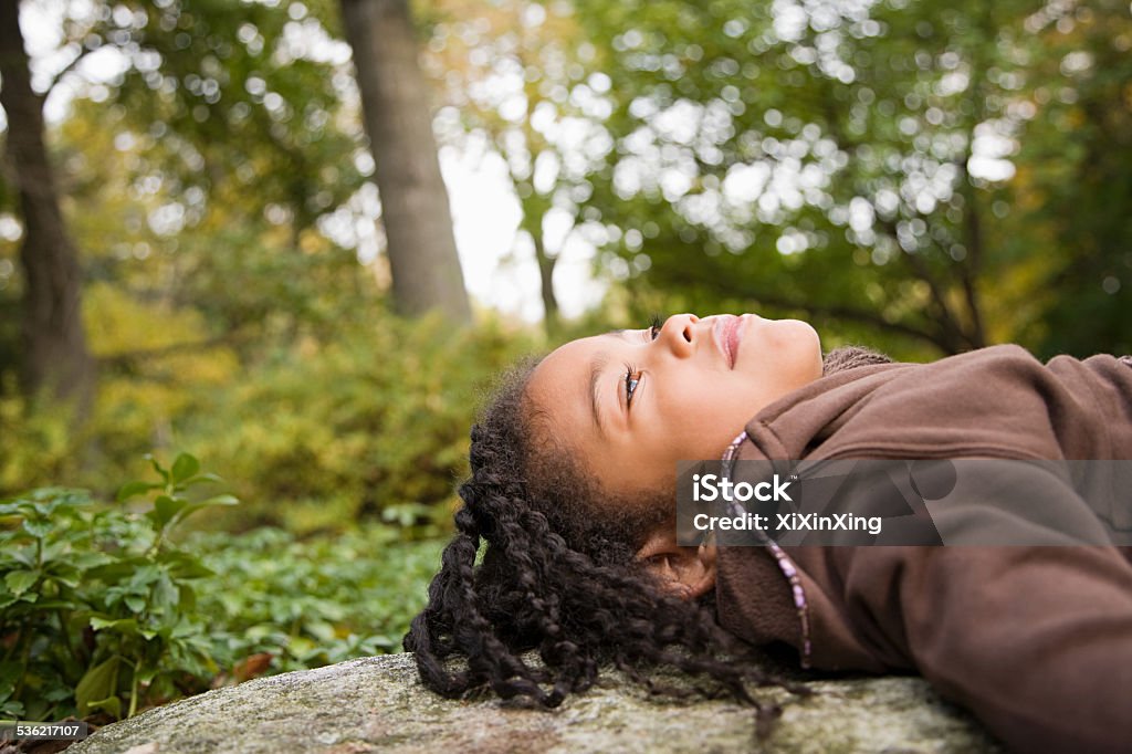 Girl in a forest Child Stock Photo