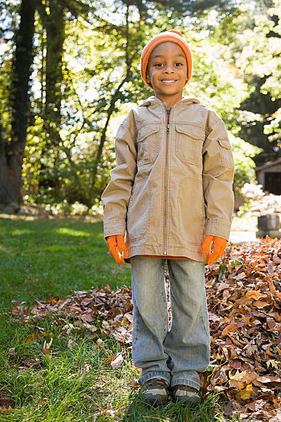 Boy in garden in autumn