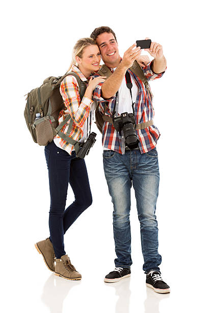 couple taking self portrait beautiful couple taking self portrait using smart phone binoculars photos stock pictures, royalty-free photos & images