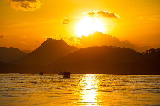 Golden sunset on the Mekong River, Vietnam. Asia