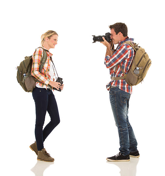 istock man taking photo of his girlfriend 536221713
