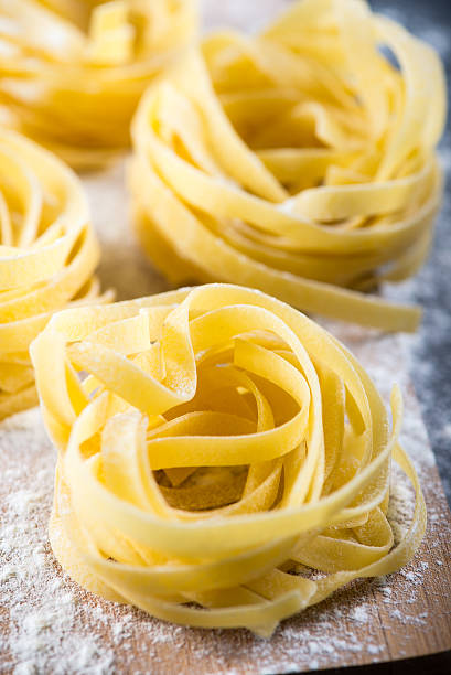 istock Preparation of italian tagliatelle pasta from above 536221845