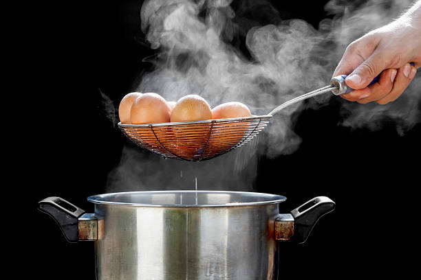 boiling eggs in stainless steel pot