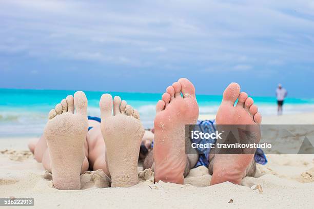 Closeup Male And Female Feet On White Sand Stock Photo - Download Image Now - Adult, Backgrounds, Barefoot