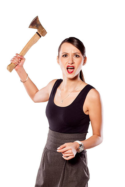 istock Furious young woman swinging an ax 536245545