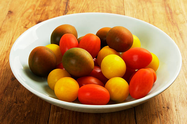 istock Mixed Varieties Of Tomato In Bowl 536248375