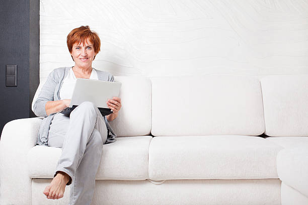 istock Mature woman with laptop 536250155